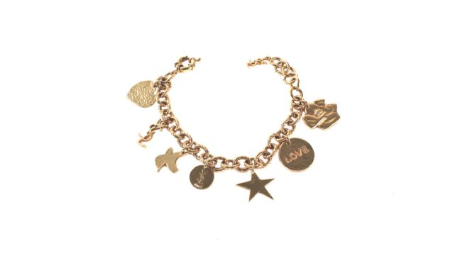 Yves Saint Laurent gold tone charm bracelet