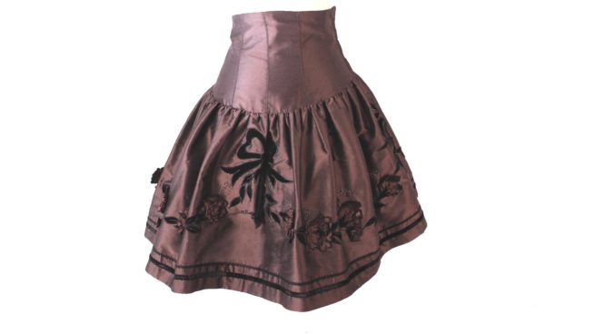 Designer Charivari velvet bows & tassel skirt