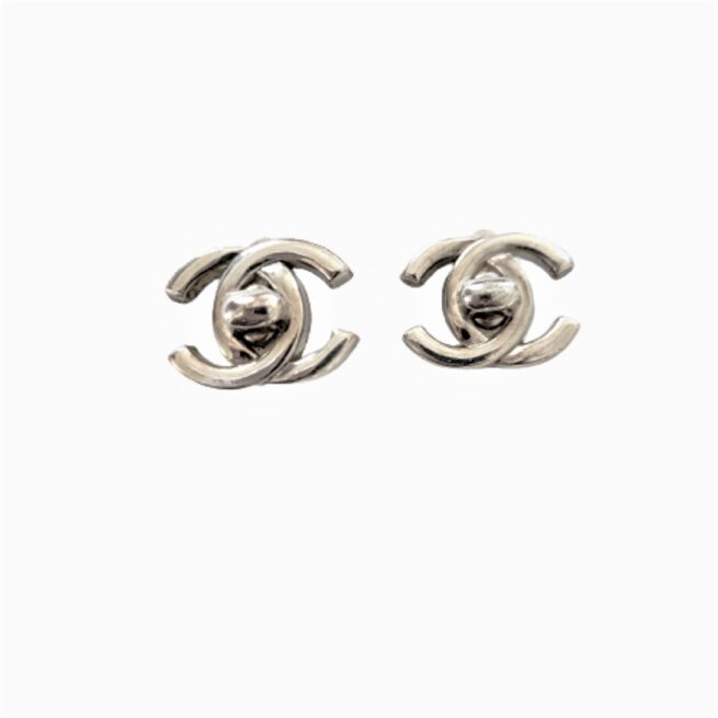 chanel silver tone turn lock vintage clip on earrings